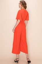 Load image into Gallery viewer, V-NECK CULOTTE JUMPSUIT WITH WAIST TIE
